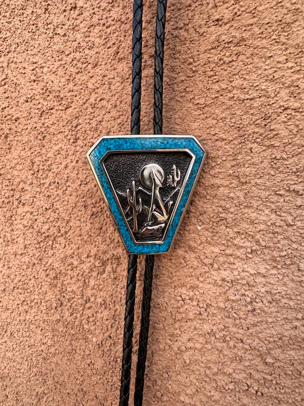Howling Coyote with Turquoise Flake Bolo Tie