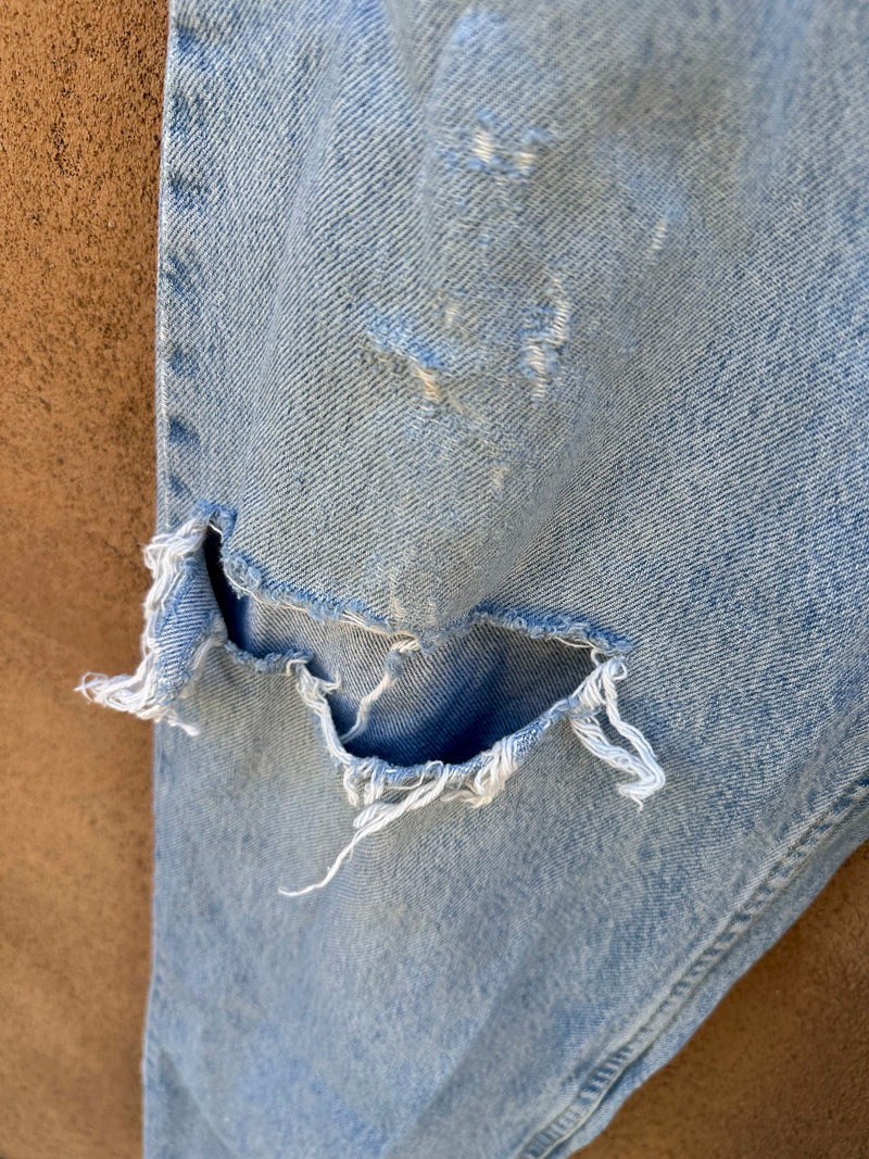 Light Wash Lee Jeans with Distressed Knees 36 x 36