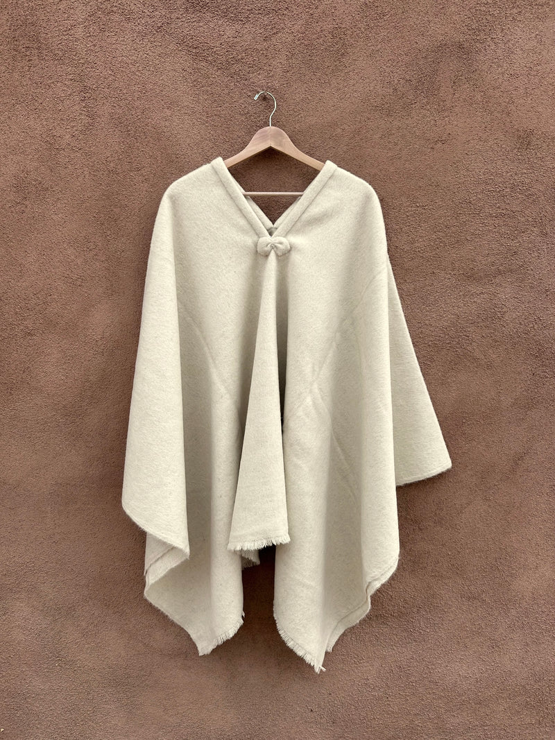 Cream Colored Wool Poncho with Fringe