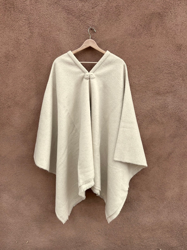 Cream Colored Wool Poncho with Fringe