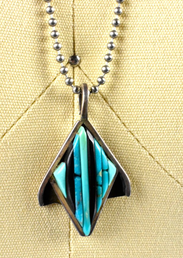 Uniquely Shaped Turquoise and Onyx Pendant Set in Sterling Silver