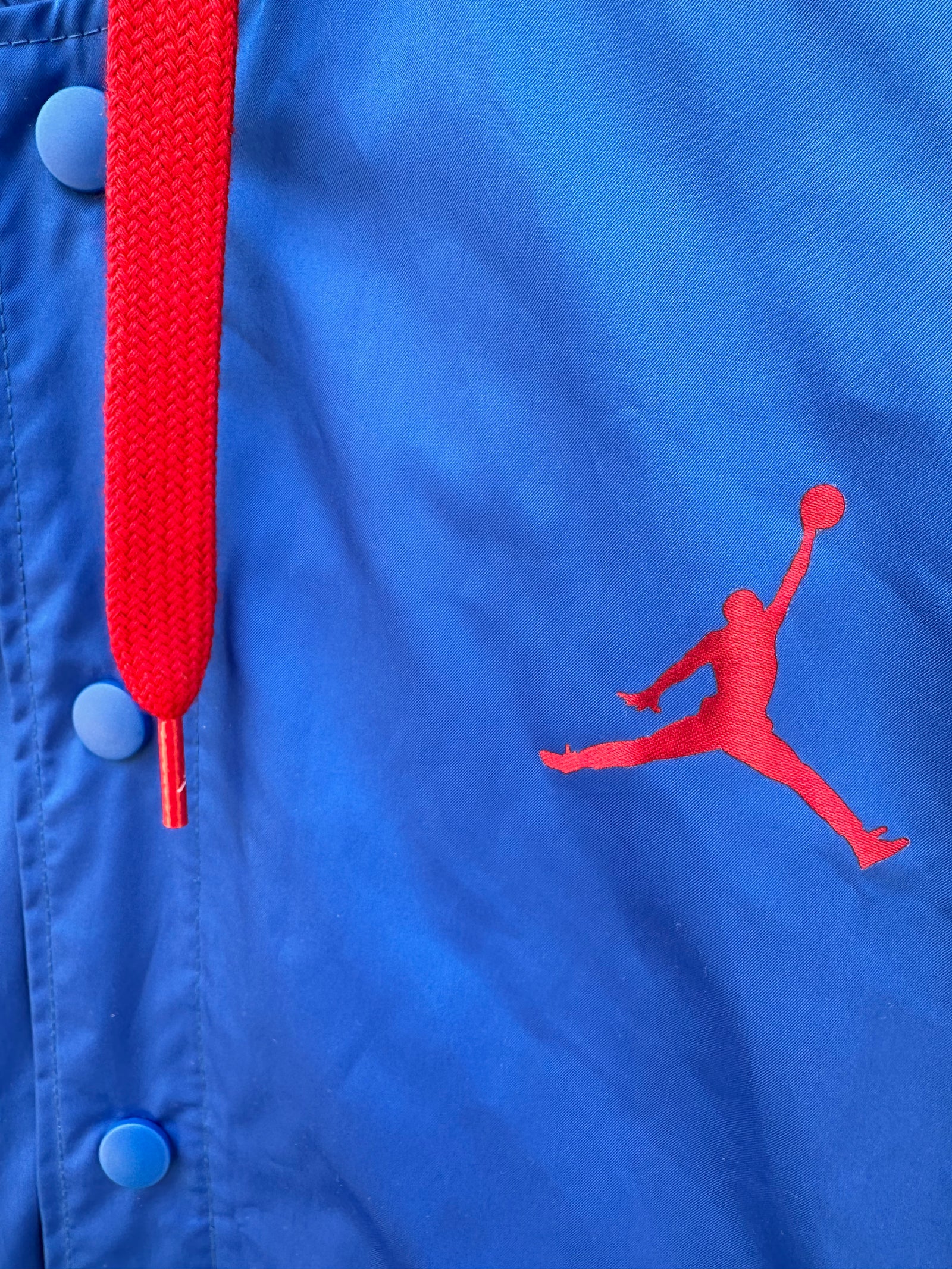 Red and white jordan windbreaker sales